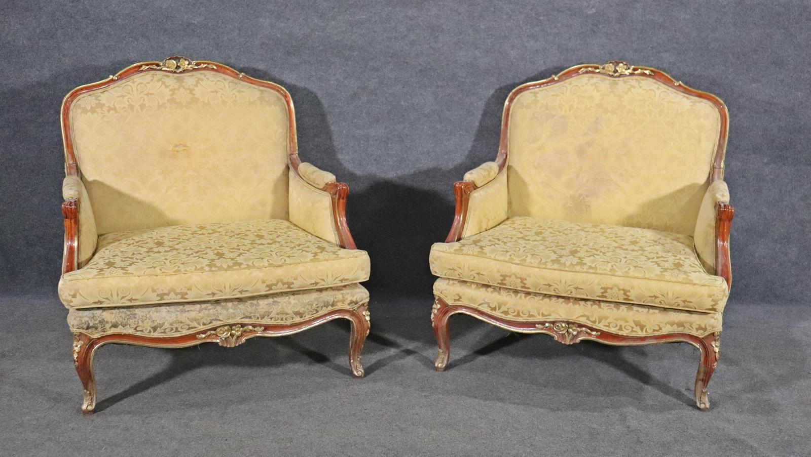Louis XV style. Upholstered seat back and arms. Gilt accents. Measures: 39 1/2