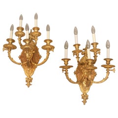 Bonito par de candelabros de cinco luces de bronce dorado de finales del siglo XIX