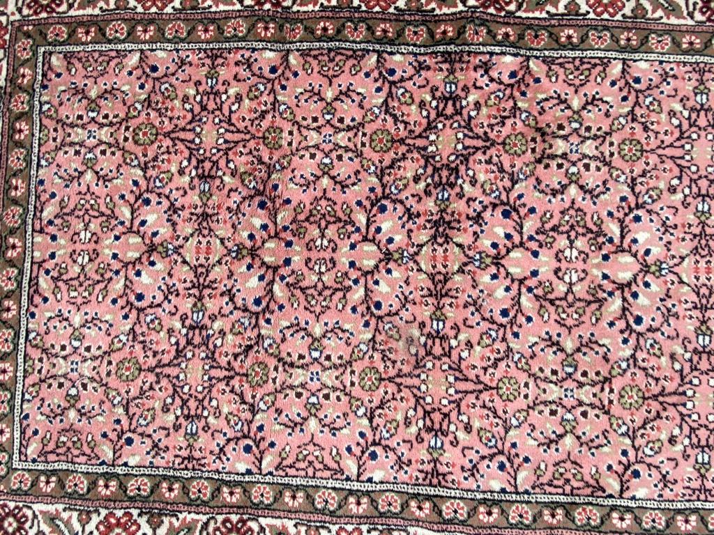 Mid-20th century Turkish rug with a floral design and a pink field color, with green and orange, entirely hand knotted with wool velvet on cotton foundation.

✨✨✨
