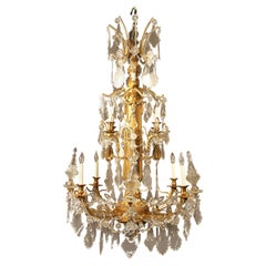 Lustre du 19ème siècle de belle qualité, en bois doré, bronze doré et cristal de Baccarat