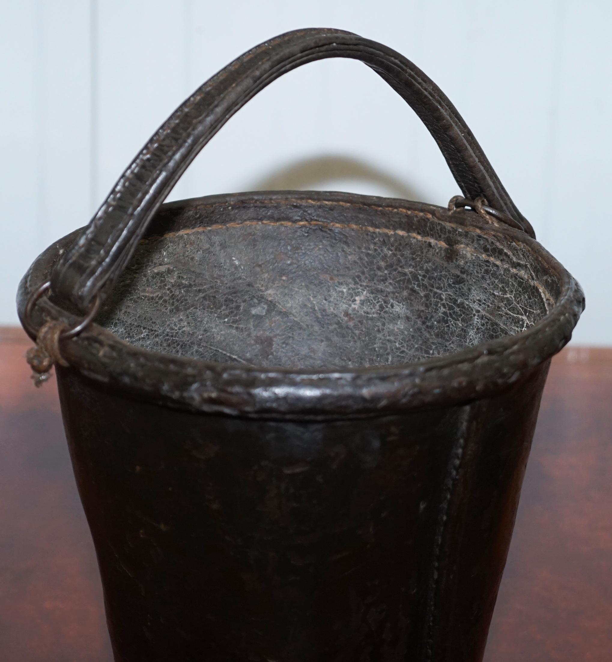 We are delighted to offer for sale this stunning original circa 1800 iron and leather bound fire bucket with original handle

I have another which is early 18th century listed under my other items

A very decorative and well made piece, well