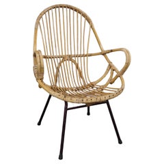 Beau fauteuil en rotin avec accoudoirs, design néerlandais, 1960