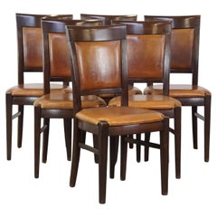 Nice set of 6 beautiful sheepskin leather dining chairs finished with wood