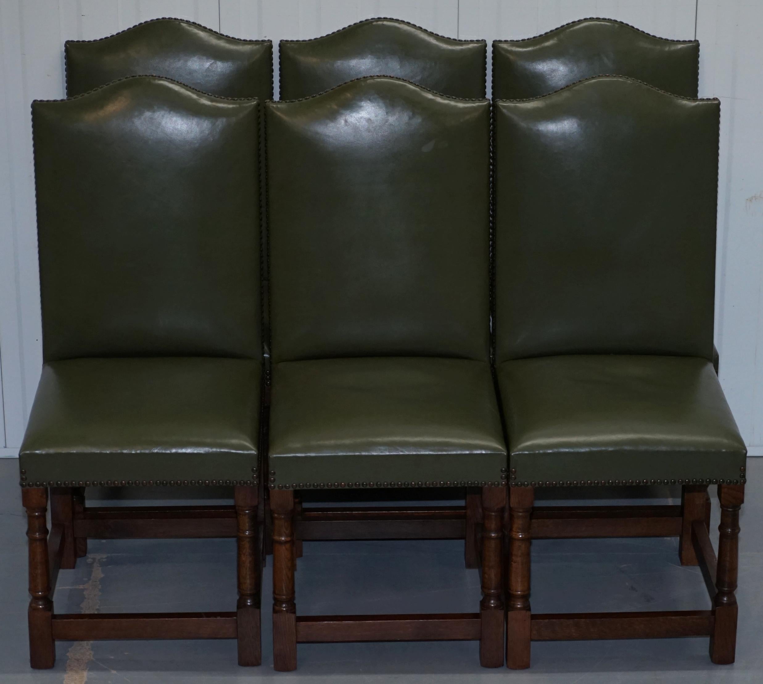 We are delighted to offer for sale this original set of six solid oak Edwardian green leather upholstered high back dining chairs.


The set are in good used condition throughout, very solid strong and stabile, the padding is medium and very