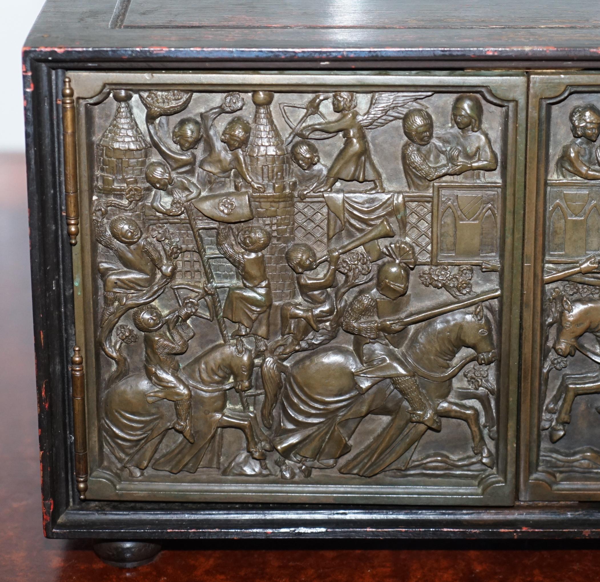 English Nice Small Cabinet or Cupboard with Bronze Doors Depicting a Jousting Tournament