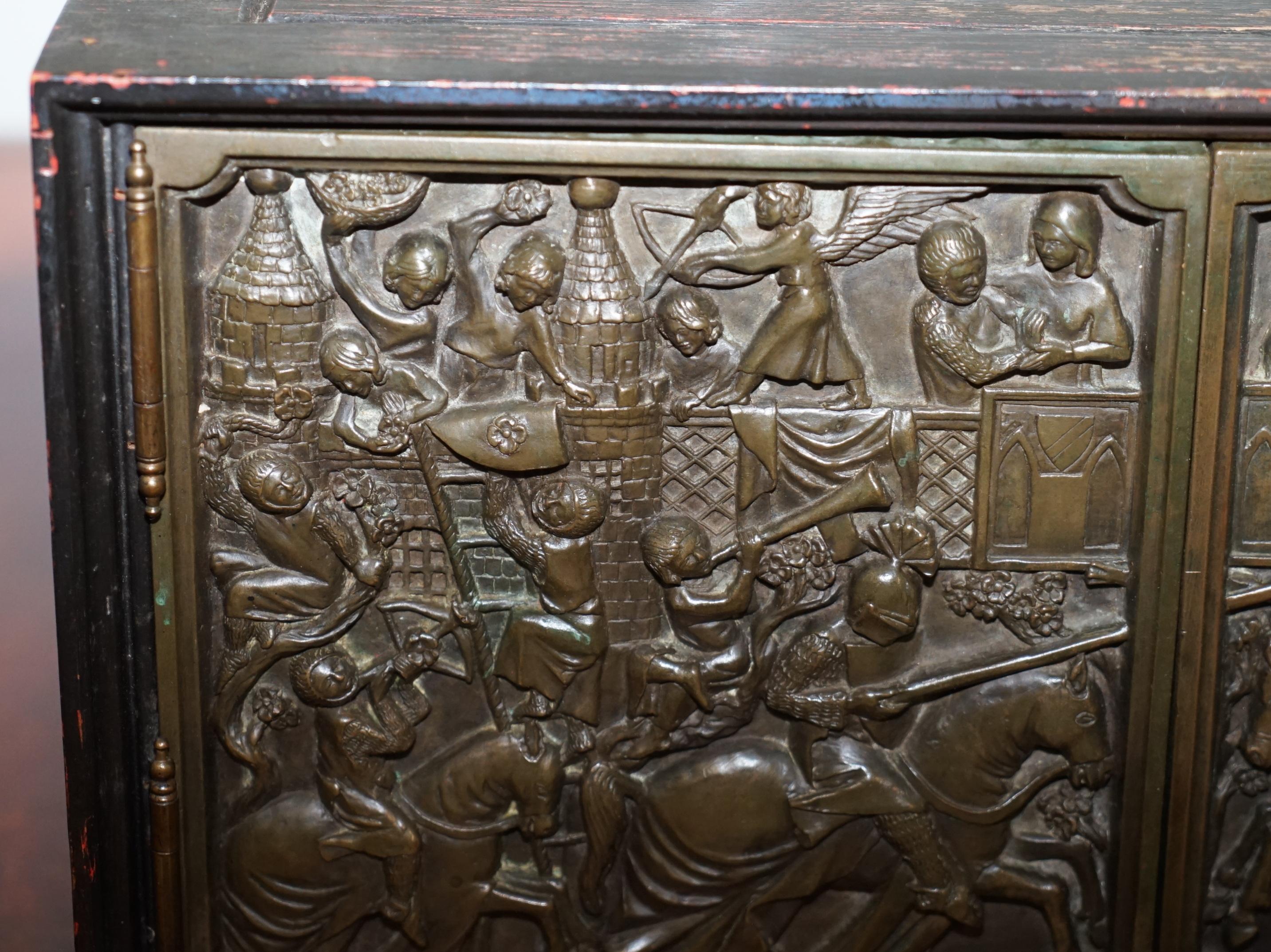 Cast Nice Small Cabinet or Cupboard with Bronze Doors Depicting a Jousting Tournament