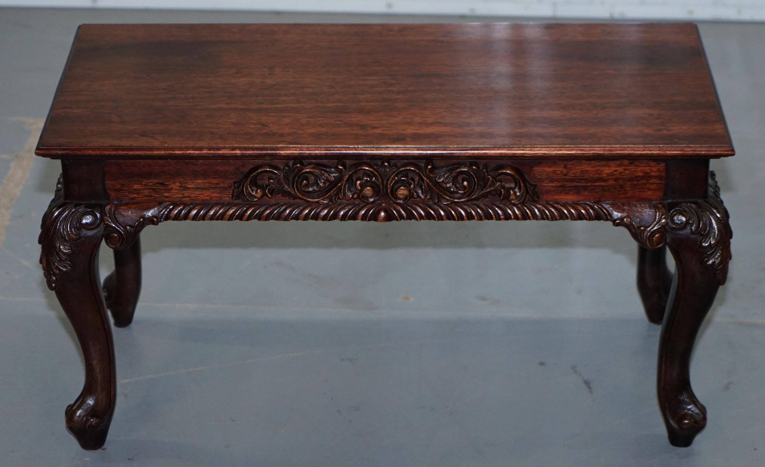 We are delighted to offer for sale this nice solid Rosewood small coffee table with carved legs that have Irish Acanthus detailing

A good practical sized table and quite decorative, the legs really make it look special 

The table has been