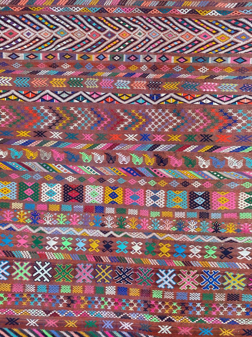 Beautiful vintage tribal rug with decorative geometrical design and nice colors, entirely handwoven with silk and wool on cotton foundation.