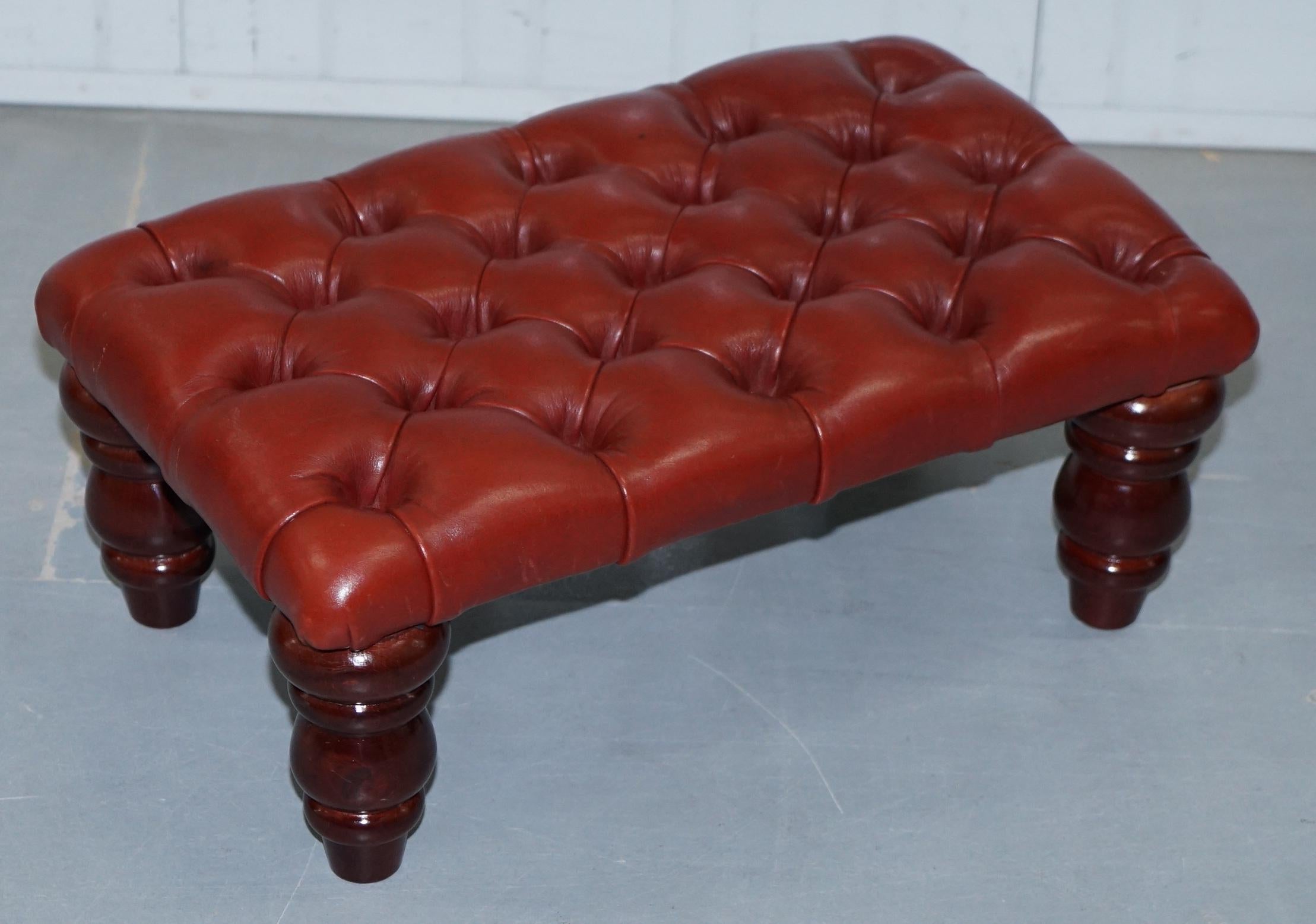 We are delighted to offer for sale this sweet little Oxblood Chesterfield buttoned footstool ideally suited to Wingback armchairs 

A great piece, basically new, it suits wingbacks because it’s the right height to slide inside the gap between the