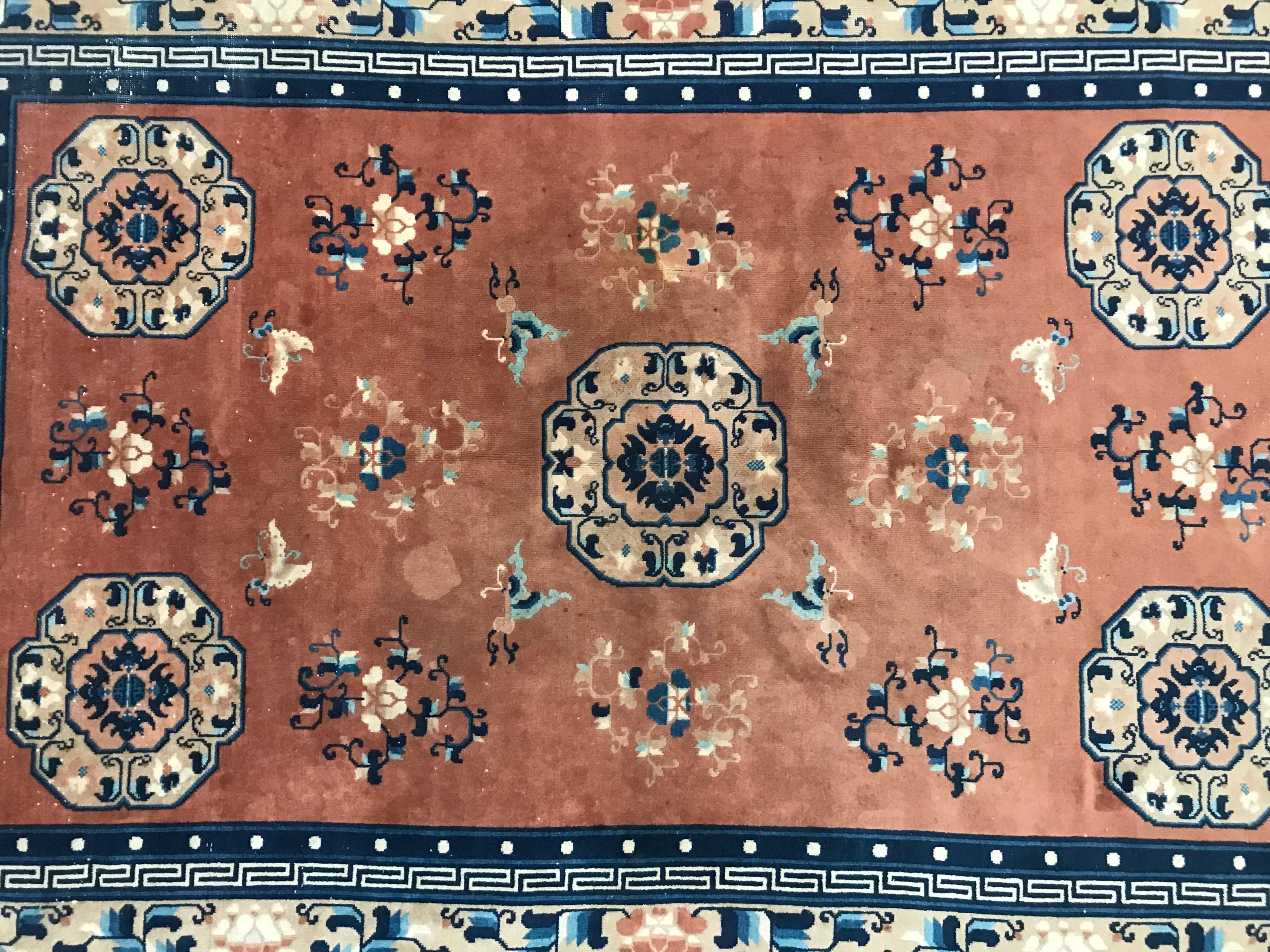 Beautiful midcentury Chinese rug with Chinese design and nice colors with orange and blue, entirely hand knotted with wool velvet on cotton foundations.
