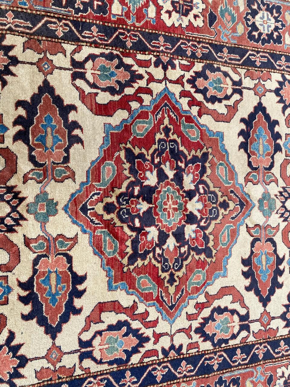 Beautiful late 20th century Afghan rug with nice decorative mahal design and beautiful colors with a beige field, entirely hand knotted with wool velvet on cotton foundation.