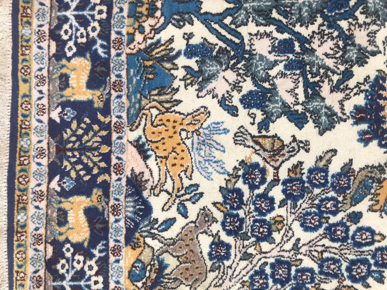 Very beautiful 20th century rug with a nice garden design with birds and animals, and light patterns and colors, with blue, green and yellow. Entirely hand knotted with wool velvet on cotton foundation.
