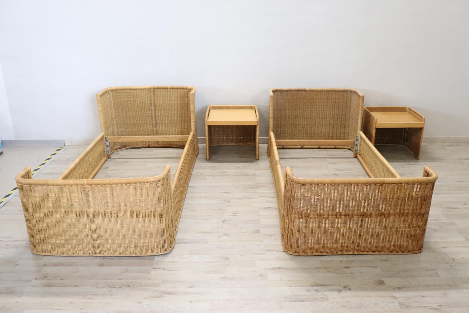 Very nice vintage 1980s Italian pair of single beds with two nightstands in rattan completely hand-woven. Particularly moved shape. In perfect vintage conditions. Attention these are the internal measurements: Width cm 84 inch 33,07 Depth cm 193