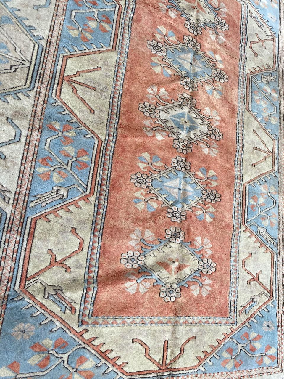 Beautiful geometrical design large Turkish rug with nice colors, entirely hand knotted with wool velvet on wool foundation.