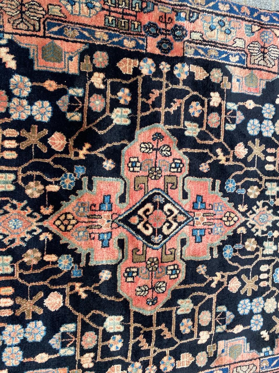 Beautiful mid century rug with nice geometrical design and beautiful colors, entirely hand knotted with wool velvet on cotton foundation.