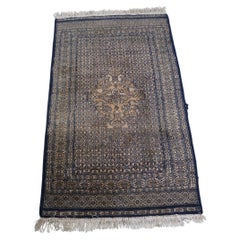 Nice vintage oriental rug in mainly blue tones 130x78cm