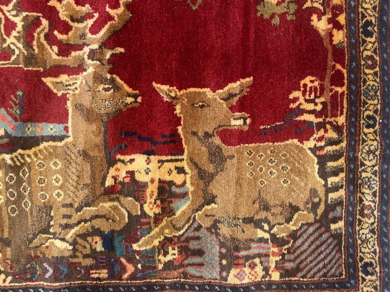 Beautiful pictural rug with nice design of deer and beautiful colors, entirely hand knotted with wool velvet on cotton foundation.