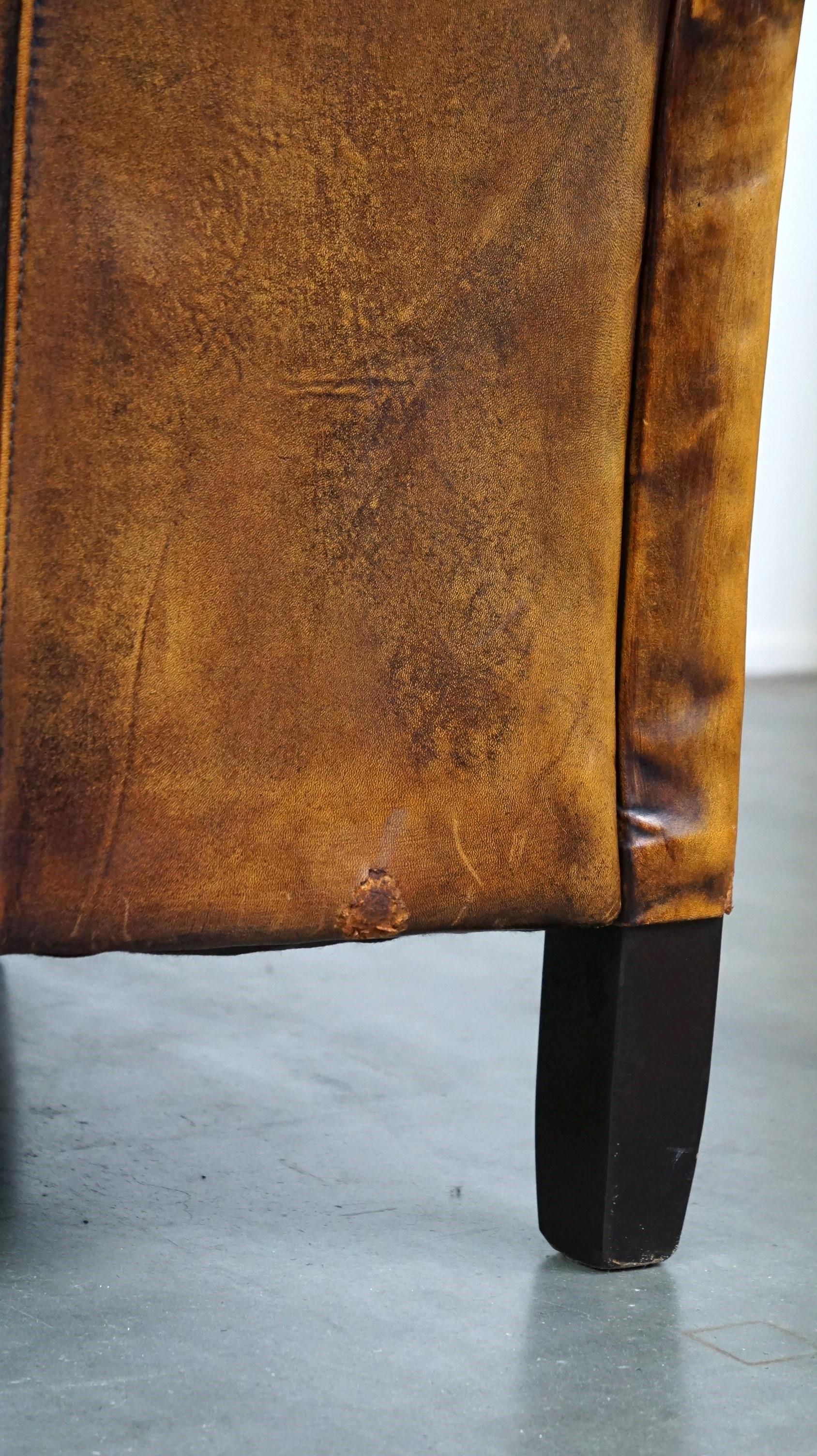 Nice vintage sheepskin armchair with beautiful colors and a comfortable seat For Sale 5