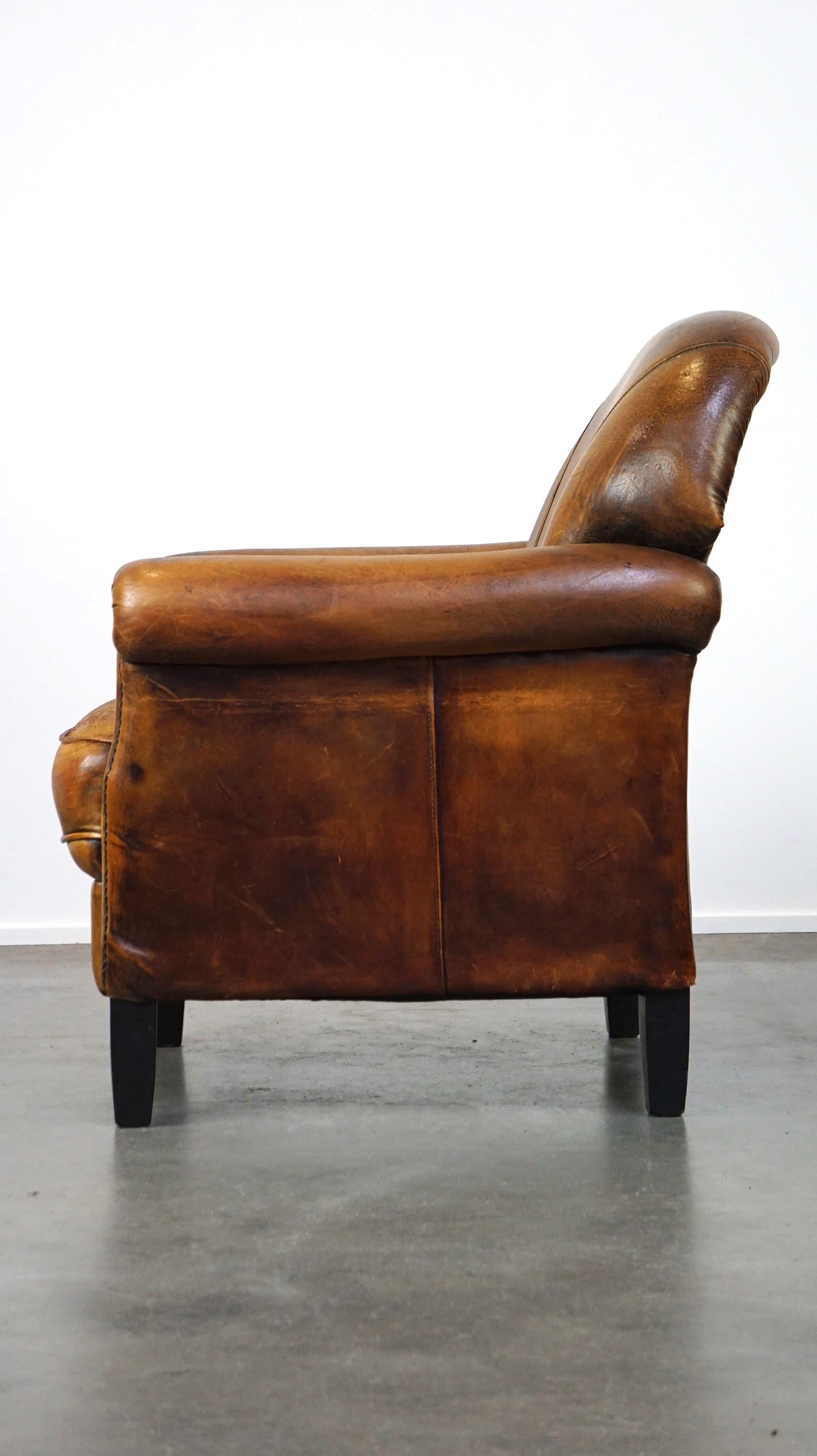 Leather Nice vintage sheepskin armchair with beautiful colors and a comfortable seat For Sale