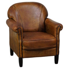 Nice vintage sheepskin armchair with beautiful colors and a comfortable seat
