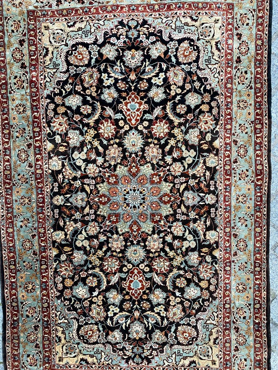 Very beautiful silk rug with a Persian design and nice colors, entirely and finely hand knotted with silk velvet on silk foundation.
