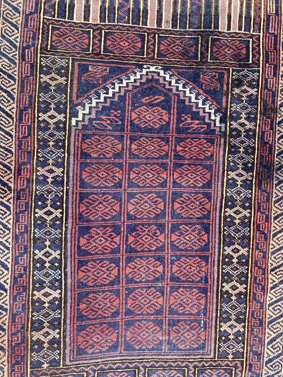 Beautiful Baluch rug with a nice design and beautiful colors, entirely hand knotted with wool velvet on wool foundation.