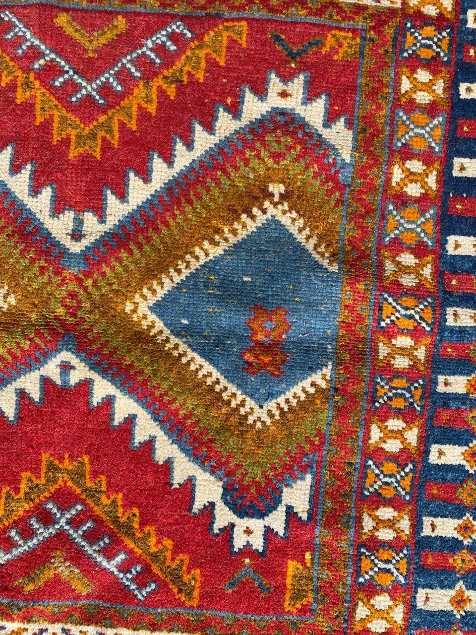 Very beautiful vintage Moroccan tribal rug with nice geometrical design and beautiful colors, entirely hand knotted with wool velvet on wool foundation