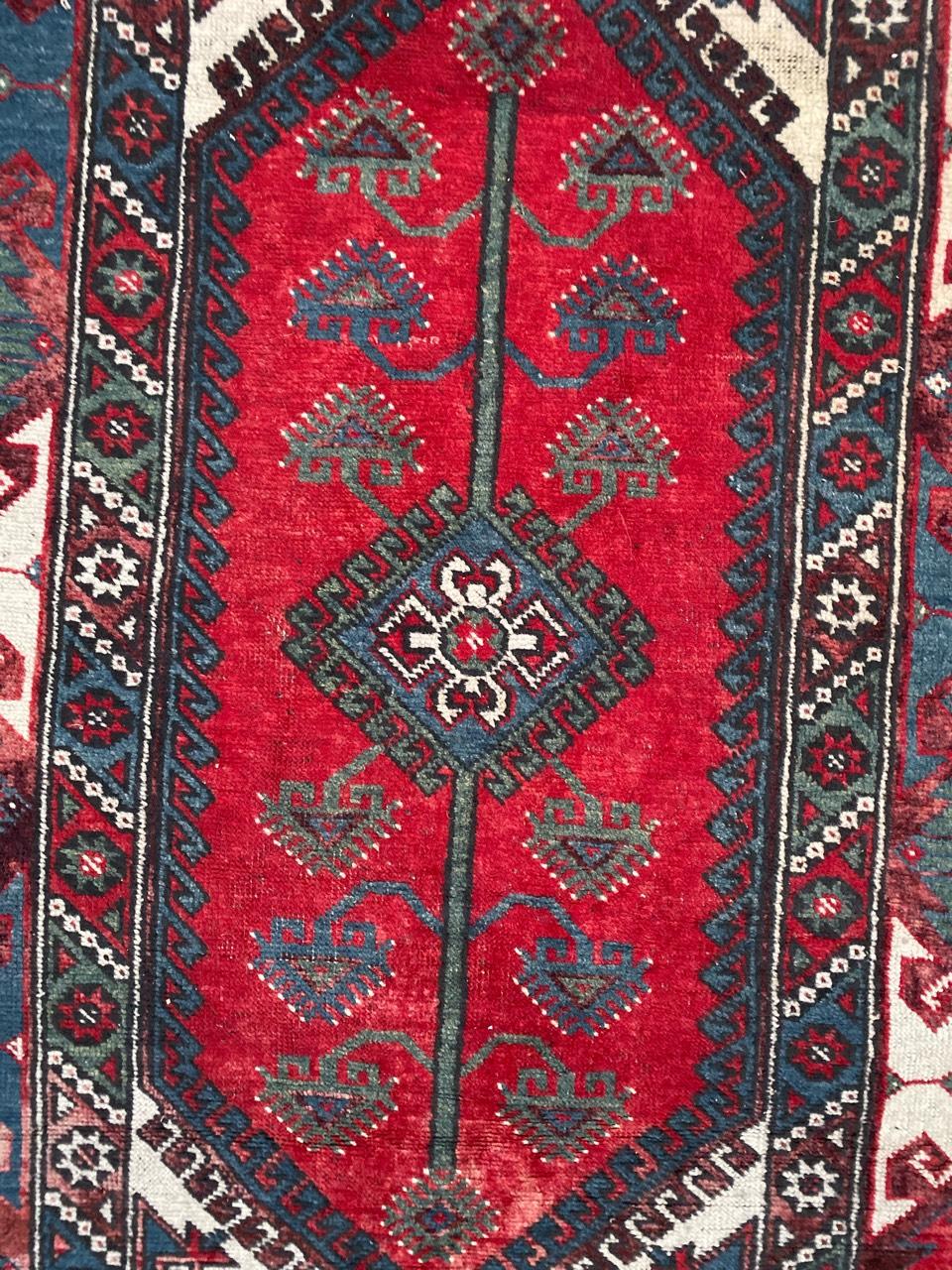 Very beautiful midcentury Turkish rug with a nice geometrical design and beautiful colors with red, blue and green, entirely hand knotted with wool velvet on wool foundation.