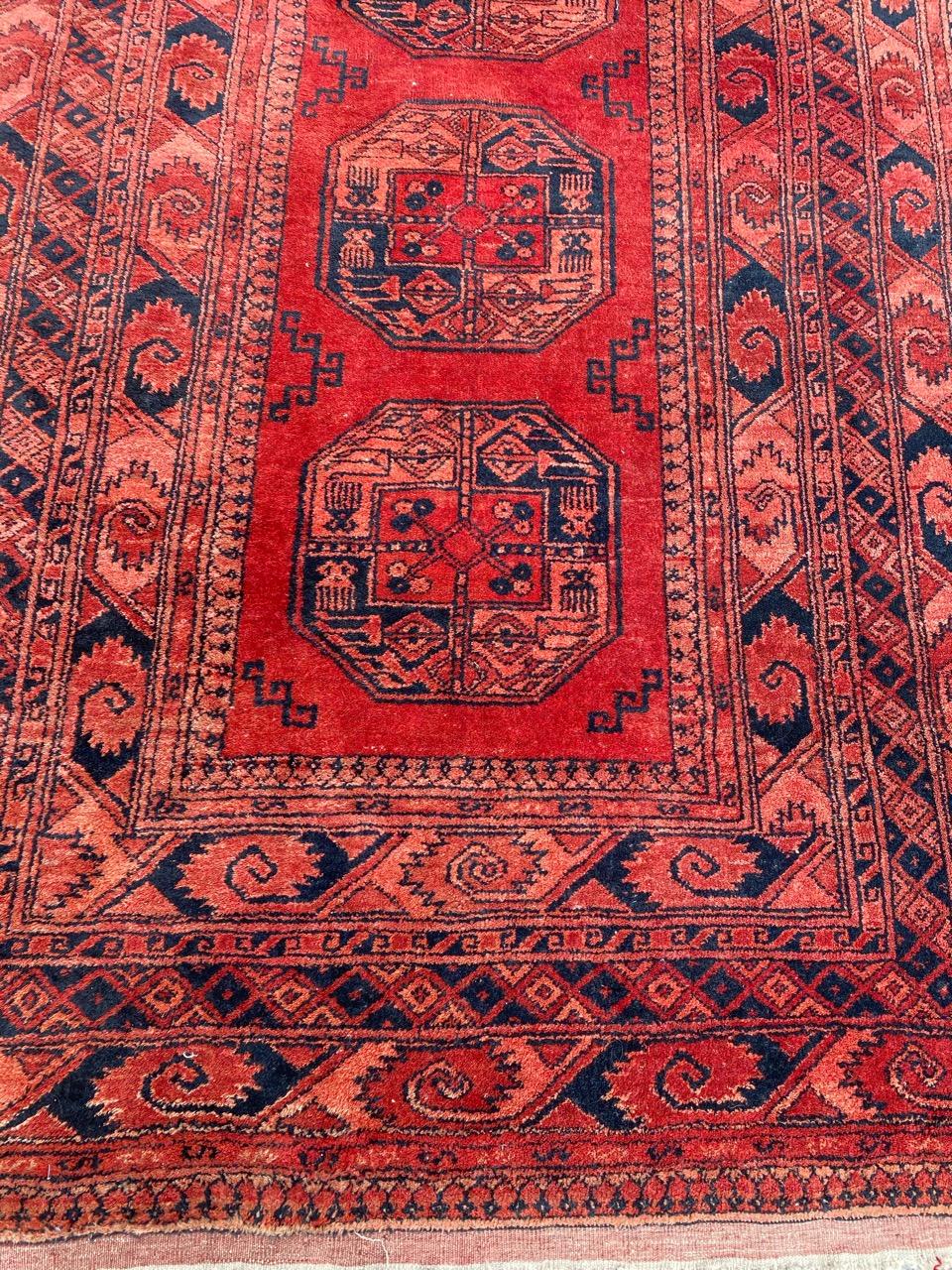 Beautiful 20th century Turkmen rug with geometrical design and nice red field color, entirely hand knotted with wool velvet on wool foundation.
