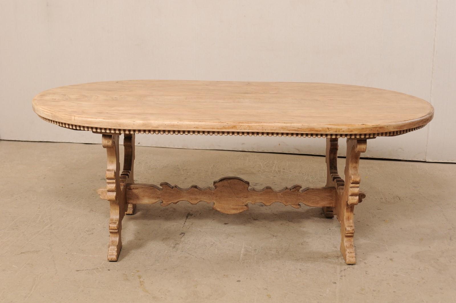 oval trestle dining table