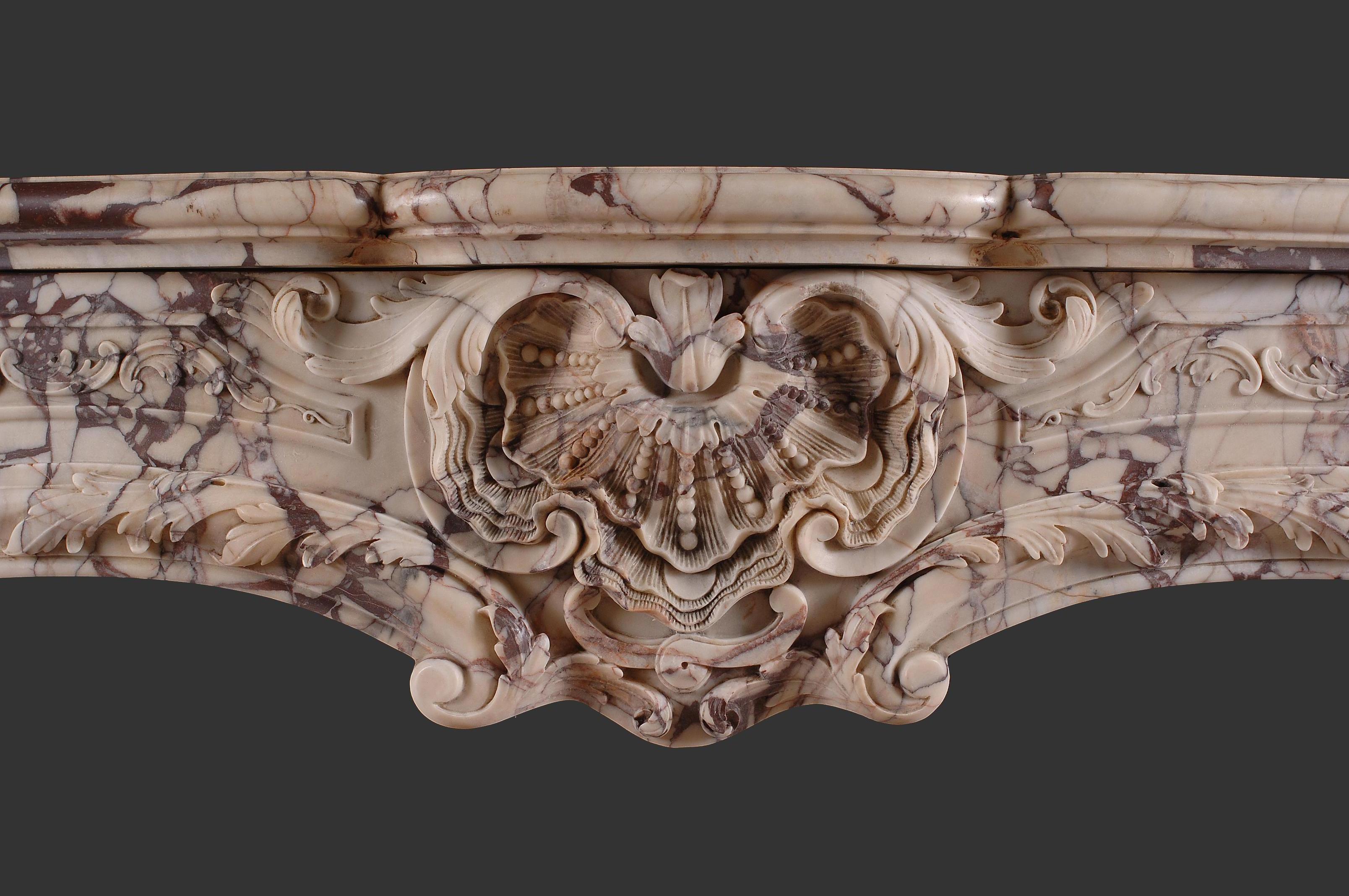 Italian Nicely carved Louis XV 19th style marble fireplace reproduction For Sale