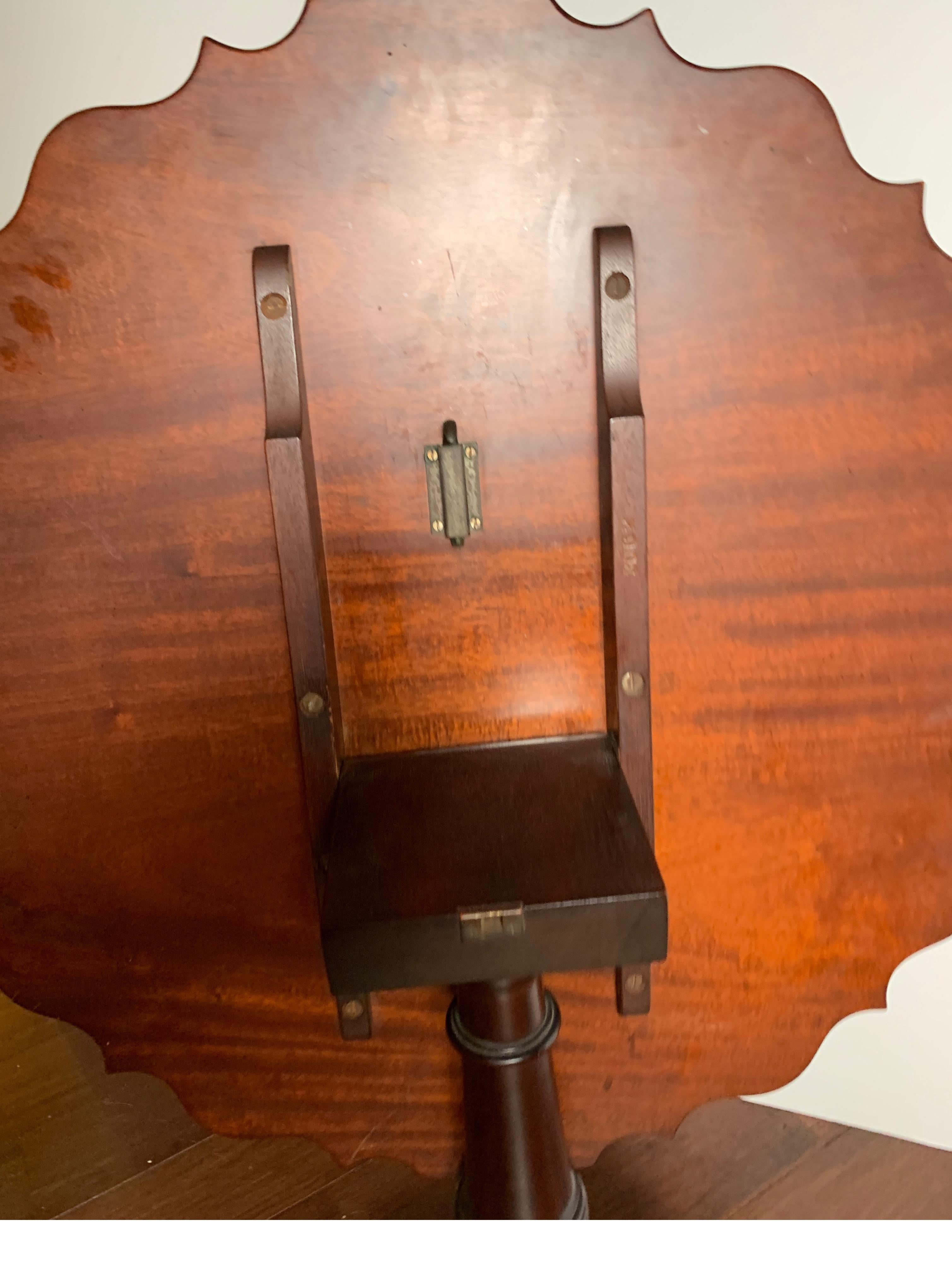 Nicely Carved Wood Tilt-Top Table, Mahogany with a Rosewood Top In Good Condition For Sale In Lambertville, NJ