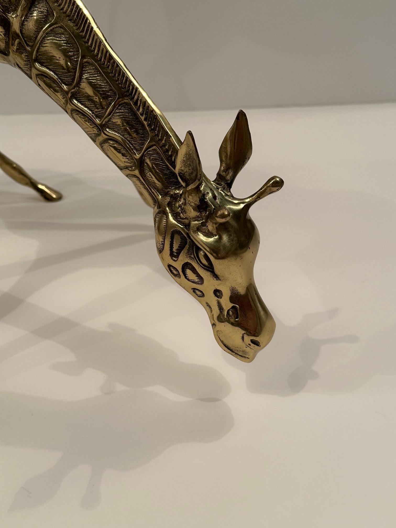 Beautiful cast brass sculpture of a whimsical giraffe.