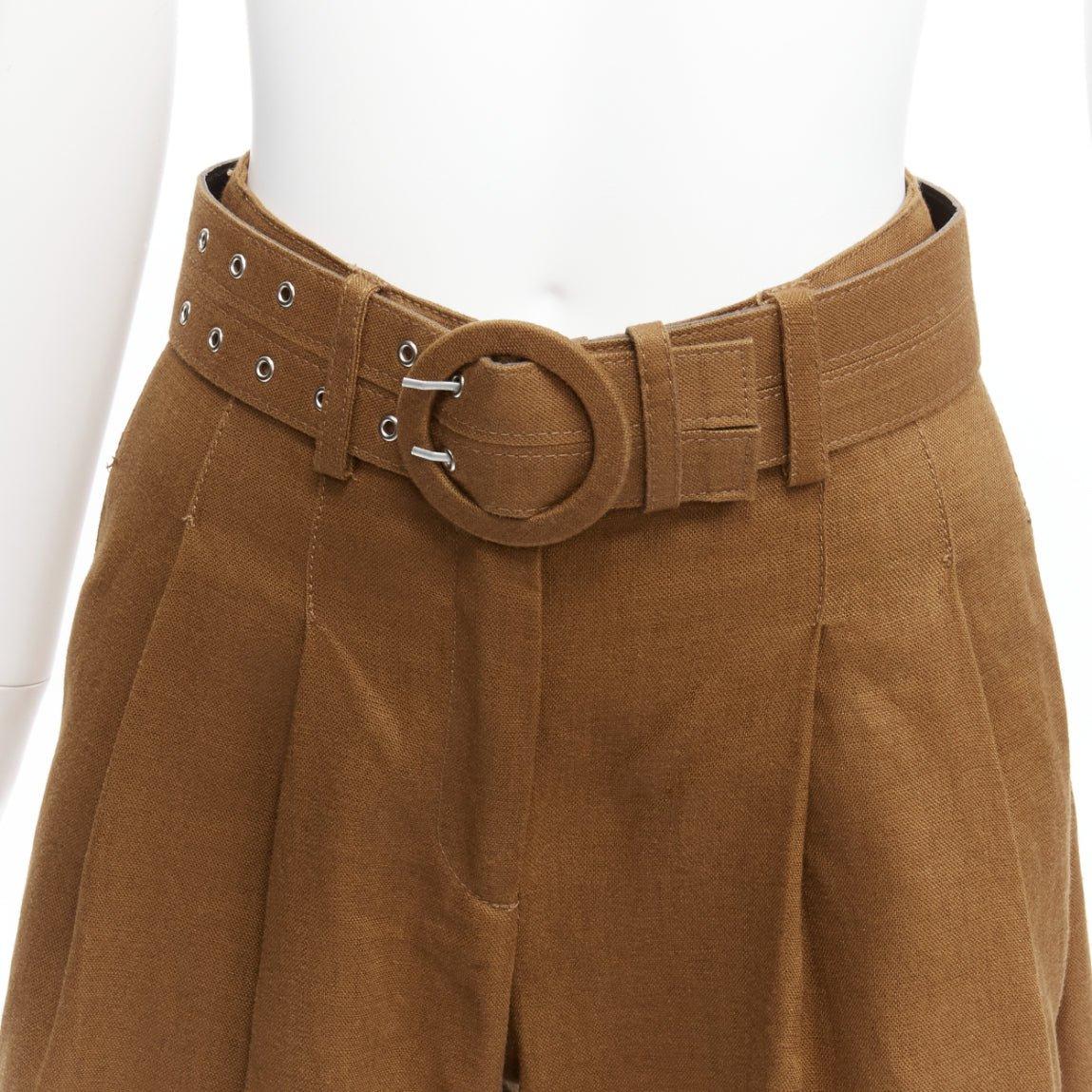 NICHOLAS marrone 100% lino pantaloni a vita alta con cintura a gamba larga US6 M
Riferimento: SNKO/A00331
Marchio: Nicholas
Materiale: Lino
Colore: marrone
Modello: Tinta unita
Chiusura: Cintura
Fodera: Tessuto marrone
Dettagli extra: Le pinces