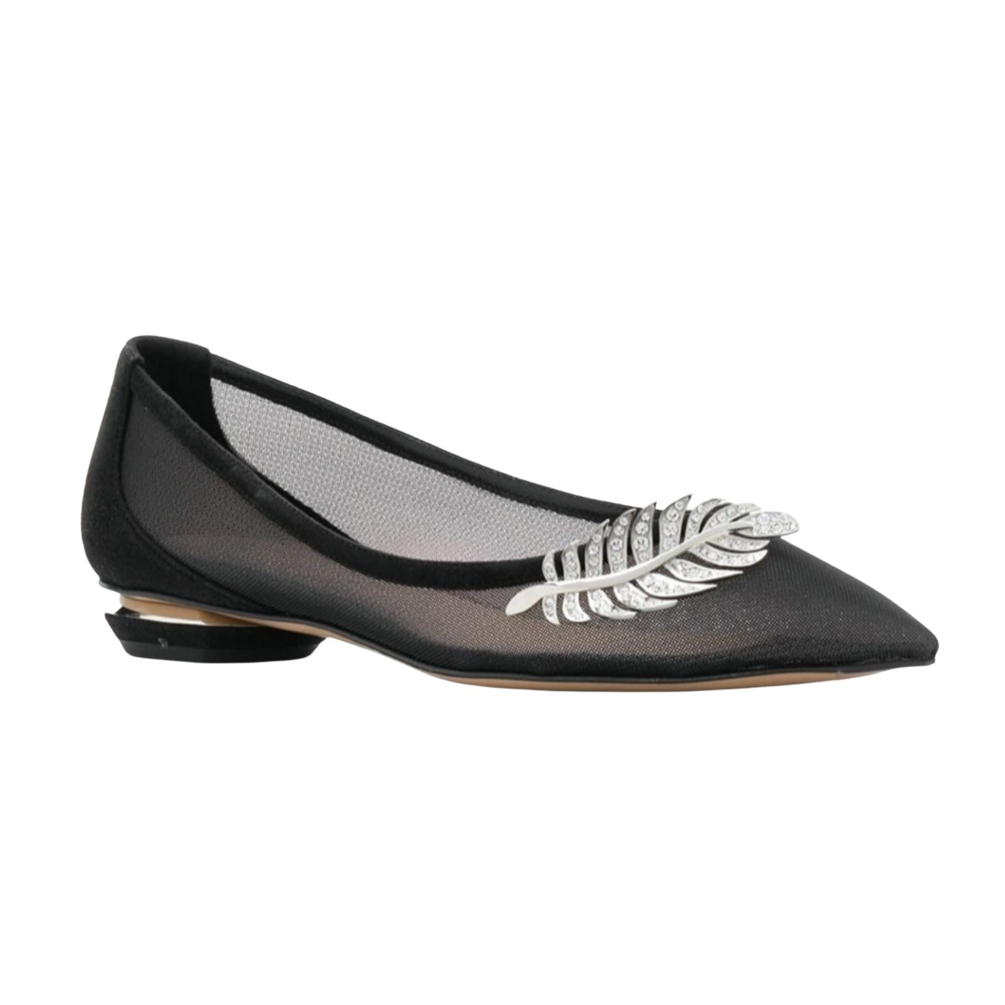 Constructed using semi-sheer black mesh with a unique faceted heel, the point-toe flat is an elevated take on an everyday silhouette. The crystal-covered leaf embellishment adds statement appeal.  (901AMSHS-N99)

COLOR: Black
MATERIAL: Mesh
SIZE: