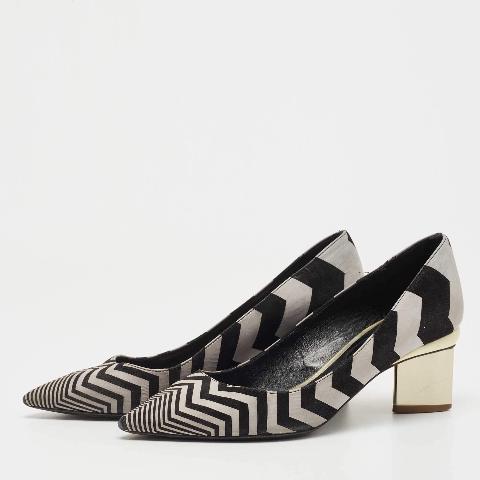 Make a chic style statement with these designer pumps. They showcase sturdy heels and durable soles perfect for your fashionable outings