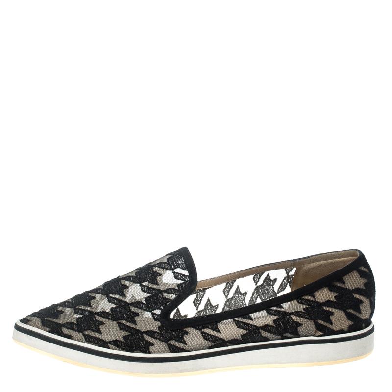 Crafted with fabric and mesh, and styled into an edgy shape, this creation from Nicholas Kirkwood is a blend of luxury and comfort. They feature pretty houndstooth embroidery, pointed toes and comfortable insoles. The loafers are so stylish they'll