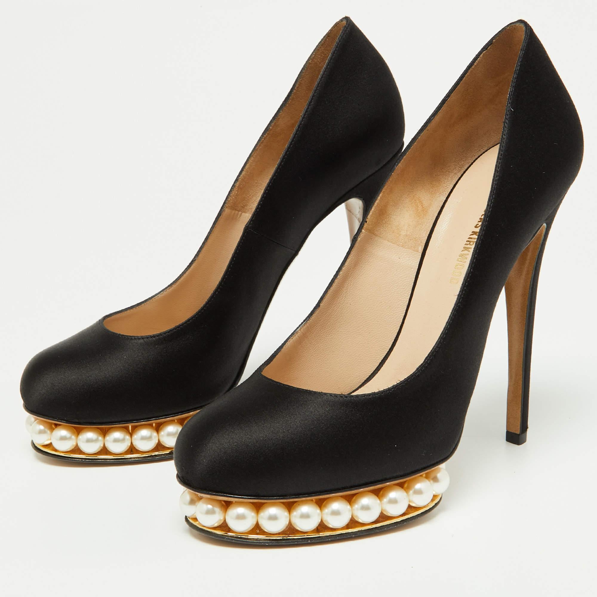Exhibit an elegant style with this pair of pumps. These elegant shoes are crafted from quality materials. They are set on durable soles and sleek heels.

Includes: Original Dustbag