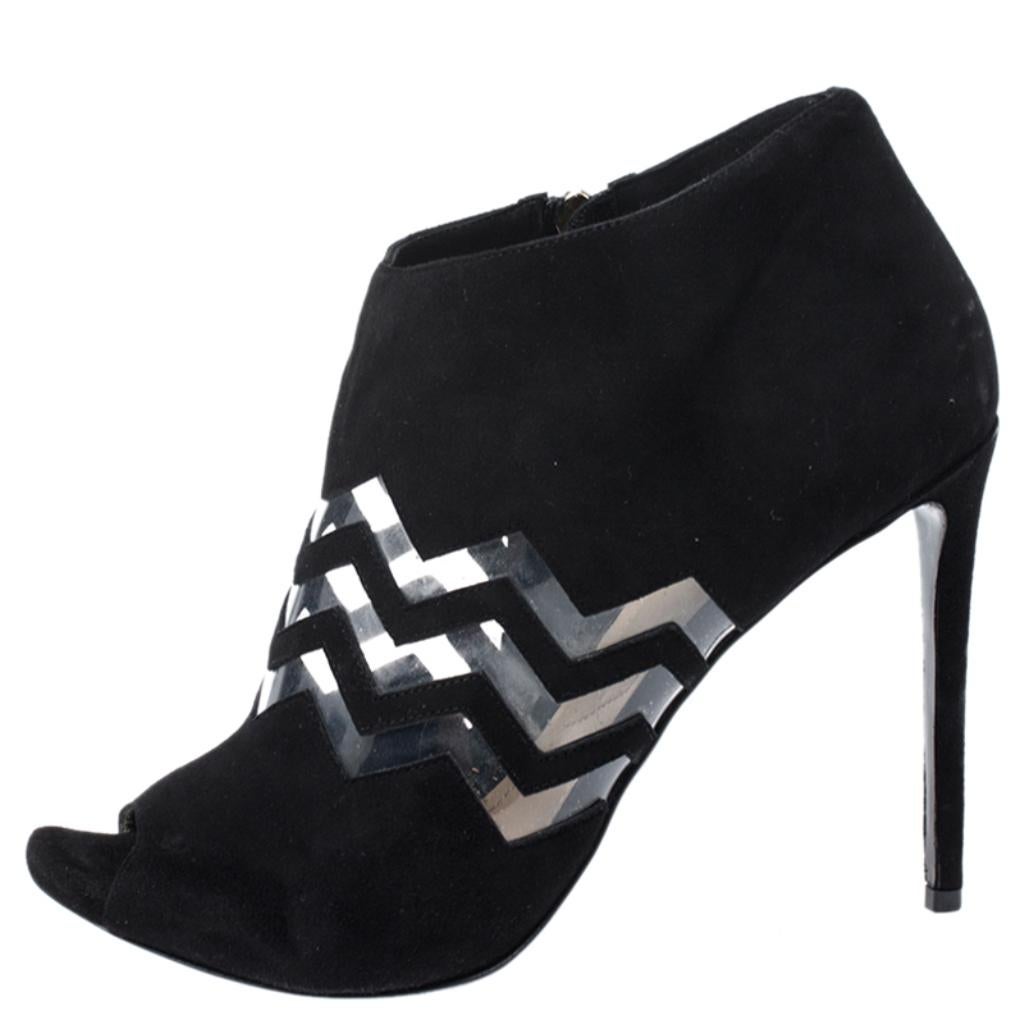 Crafted from black suede and detailed with PVC in a chevron pattern, these peep-toe booties from Nicholas Kirkwood have been purposely built to lift your style. They are complete with side zippers and 11 cm heels.

Includes: Original Dustbag,