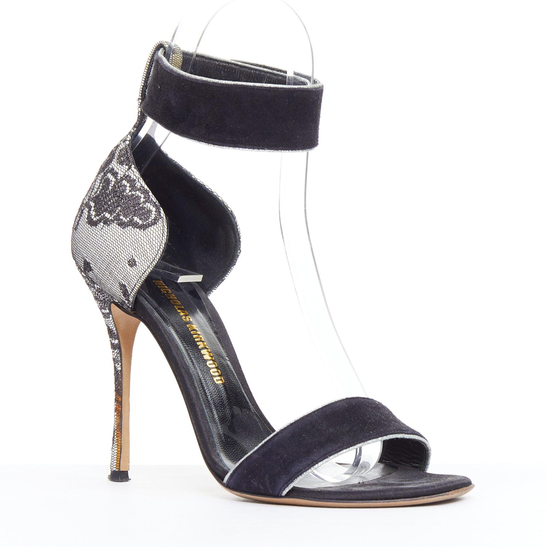 NICHOLAS KIRKWOOD black suede grey lace overlay sandals EU36
Reference: JACG/A00225
Brand: Nicholas Kirkwood
Material: Suede, Fabric
Color: Black, Grey
Pattern: Lace
Closure: Snap Buttons
Lining: Black Leather
Made in: Italy

CONDITION:
Condition: