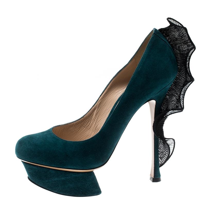 You'll fetch admiring glances with every step you take in these gorgeous pumps from Nicholas Kirkwood. These blue pumps are crafted from suede and feature an artistic silhouette. They flaunt round toes, comfortable leather-lined insoles and a