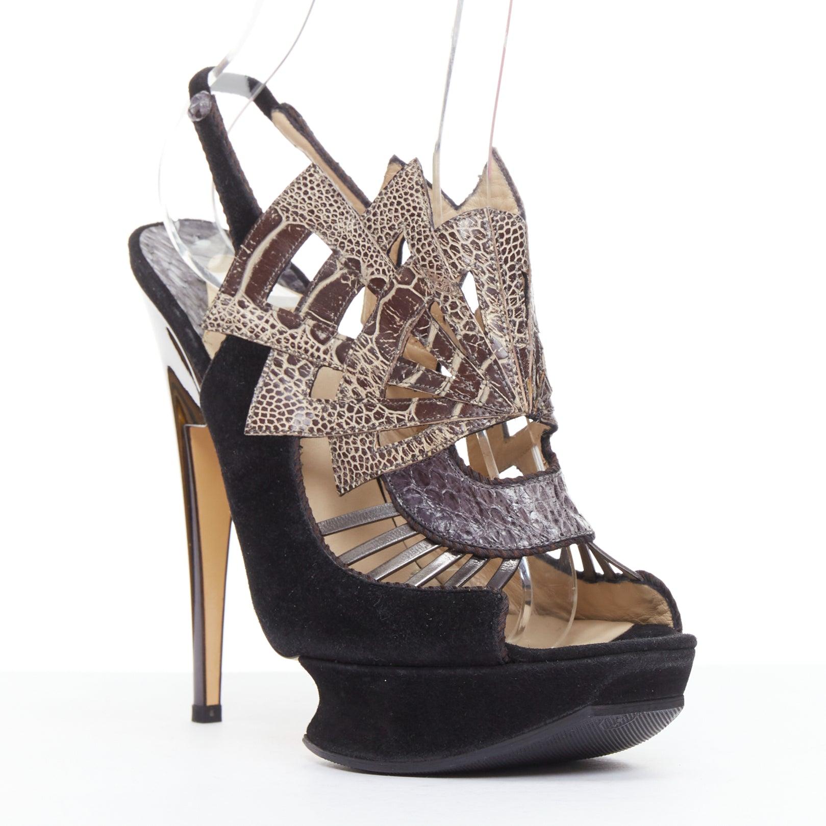 NICHOLAS KIRKWOOD brown black scaled leather platform sandals EU37.5
Reference: NKLL/A00462
Brand: Nicholas Kirkwood
Material: Leather, Suede
Color: Black, Brown
Pattern: Animal Print
Closure: Elasticated
Lining: Nude Leather
Extra Details: Deliver