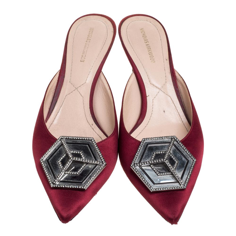 Nicholas Kirkwood's designs are inspred by modern art, architecture, and sculpture. These mules have been made in Italy from satin in a burgundy hue and styled with a crystal-encrusted hexagon motif. Wear them with cropped jeans to midi dresses and
