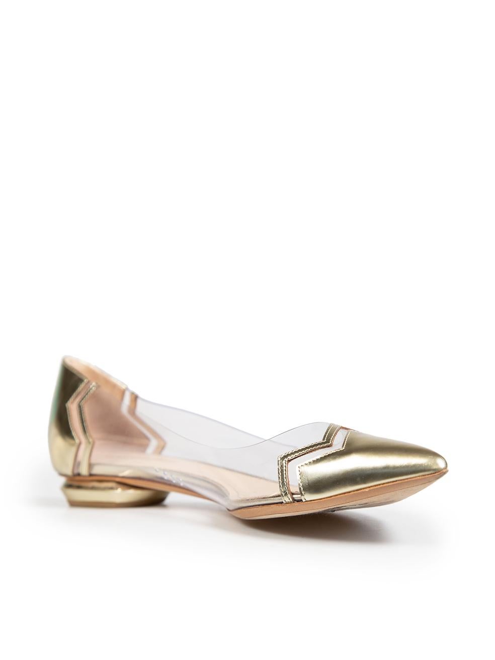 CONDITION is Very good. Minimal wear to the shoes is evident, there are mild abrasions to the rear and the heels of both shoes on this used Nicholas Kirkwood designer resale item.
 
 Details
 Gold
 Plastic
 Ballet flats
 Pointed toe
 Flat heels
 
 

