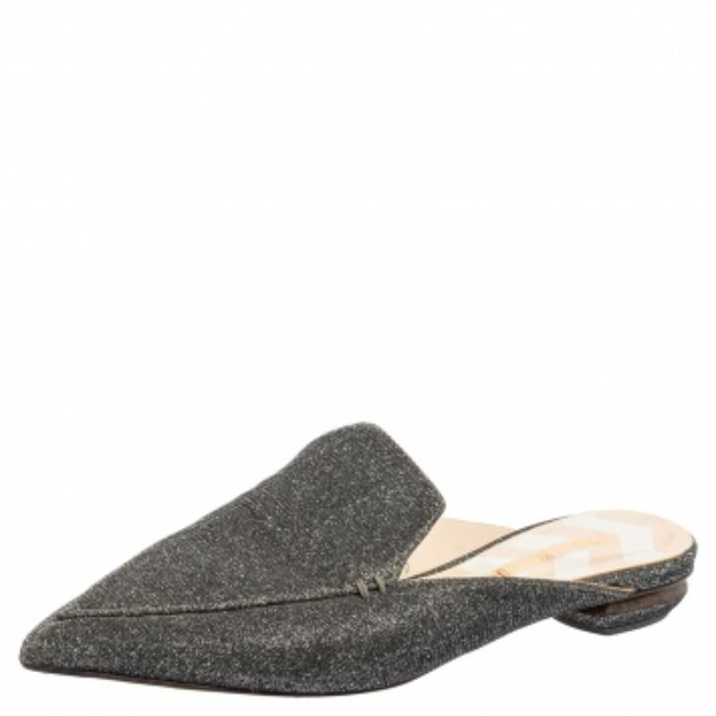 The Beya flat mules present Nicholas Kirkwood's dedication to flawless craftsmanship. The stylish slip-on mules are made from glitter leather and feature pointed toes and well-carved heels. This versatile pair will work well with office tailoring