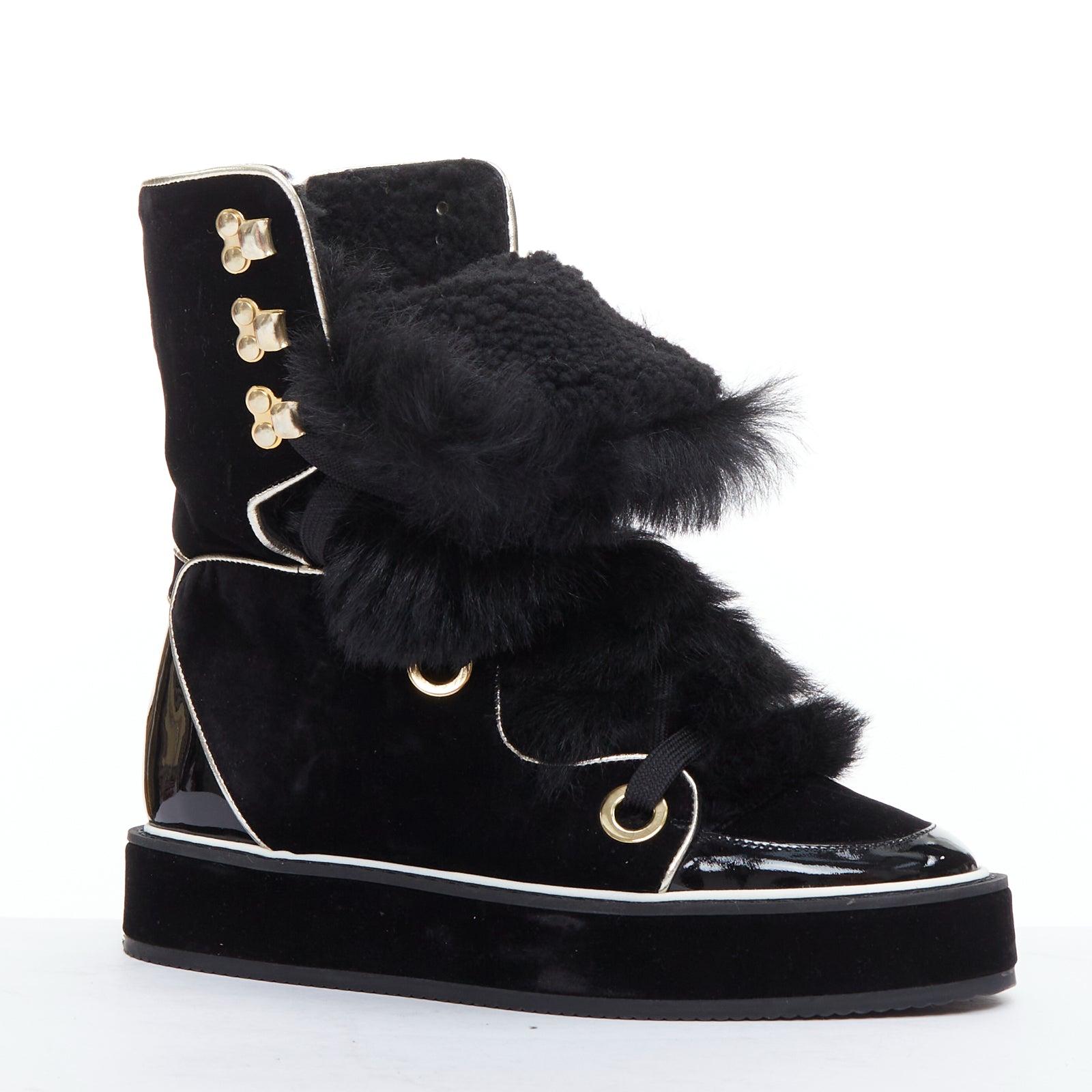NICHOLAS KIRKWOOD Polly Neige black patent fur trim snow boots
Reference: LAYU/A00058
Brand: Nicholas Kirkwood
Model: Polly Neige
Material: Fur, Patent Leather, Fabric
Color: Black, Gold
Pattern: Solid
Closure: Lace Up
Lining: Black Shearling
Extra