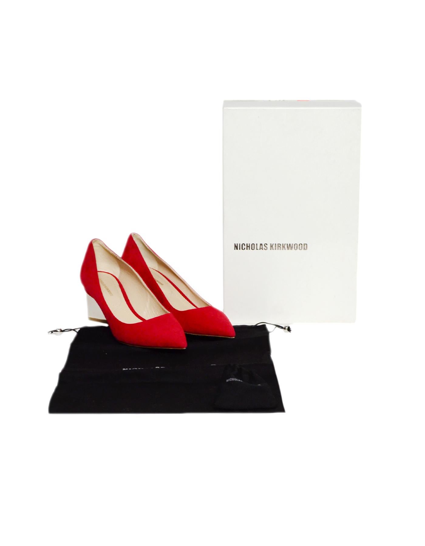 Nicholas Kirkwood Red Suede Prism Pumps w/ Silver Heels sz 37.5 rt $595

Made In: Italy
Color: Red, silver
Materials: Suede
Closure/Opening: Slide on
Overall Condition: Excellent pre-owned condition, with the exception of minor wear to