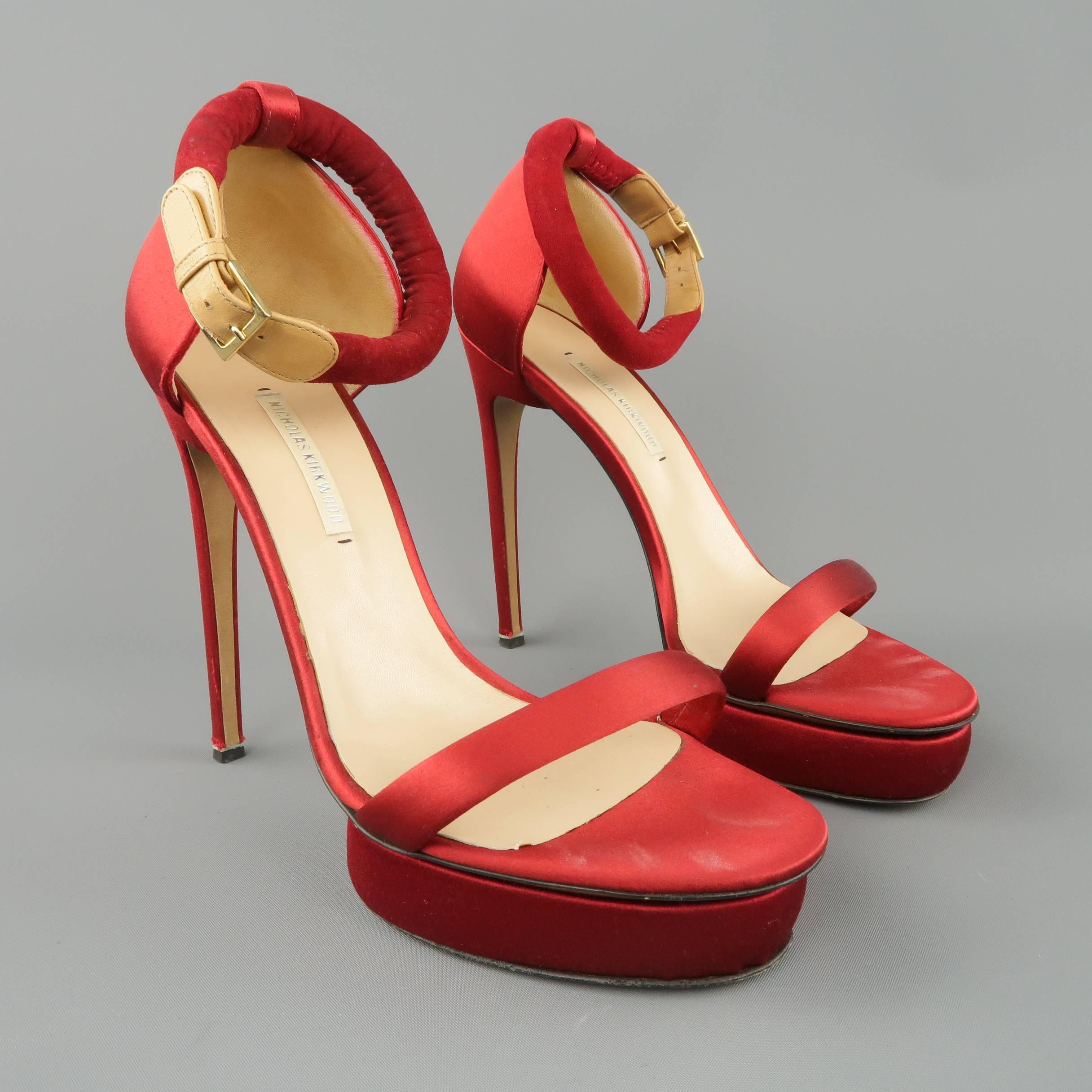 NICHOLAS KIRKWOOD sandals come in red satin and feature a slim toe strap, covered platform, high stiletto heel, and thick, padded suede ankle strap with beige leather accent. Made in Italy.
 
Good Pre-Owned Condition.
Marked: IT 39
 
Measurements:
