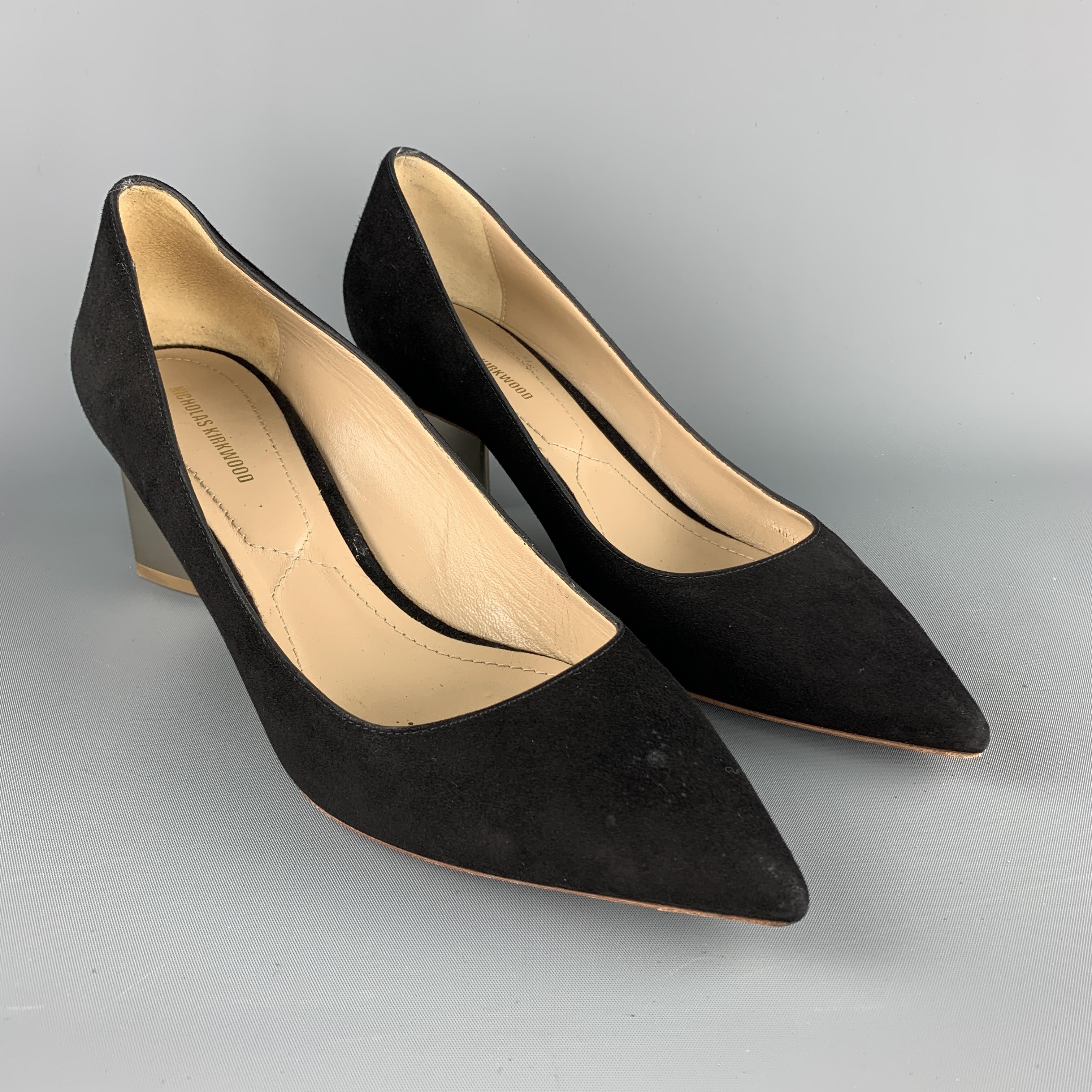 NICHOLAS KIRKWOOD pumps come in black suede with a pointed toe and gold tone metal geometric heel. Made in Italy.

Very Good Pre-Owned Condition.
Marked: IT 39.5
Original Retail Price: $595.00

Heel: 2.5 in.