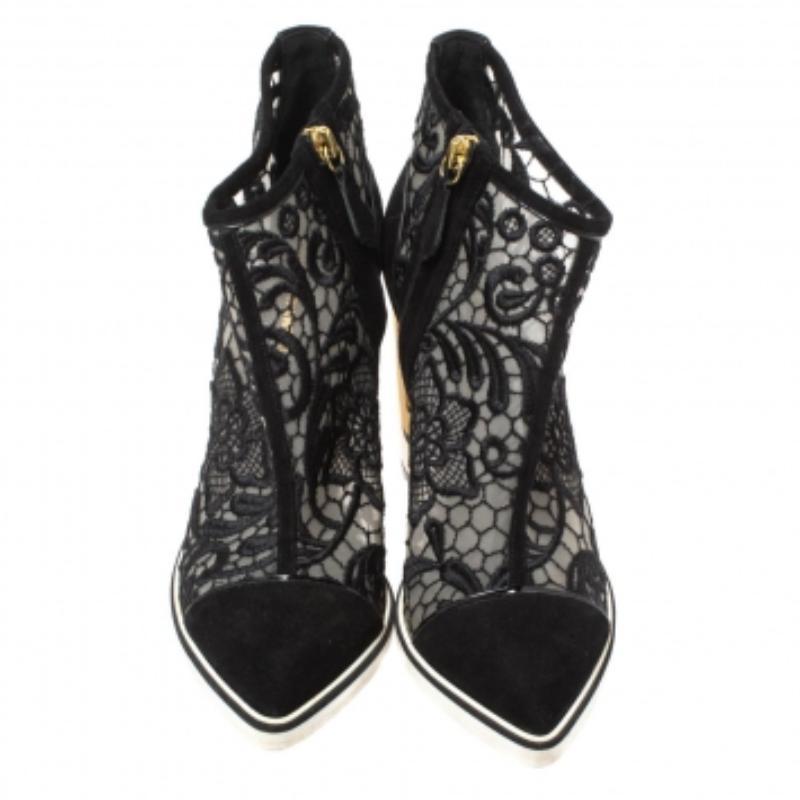Casual Fridays will look so much better at work thanks to this pair of embroidered mesh and suede boots. These ankle boots from Nicholas Kirkwood are detailed with pointed toes, a floral design on the mesh vamps, and gold-tone side zippers. Endowed
